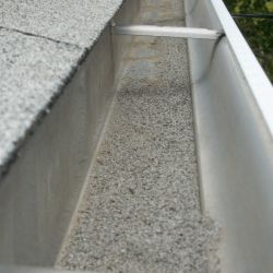 Shingle-Granules-Gutter-Regina-Roofing-Companies